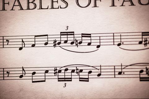 Close-up of a sheet of music titled 'FABLES OF FAU,' displaying musical notes and symbols." class="image-style-thumbnail