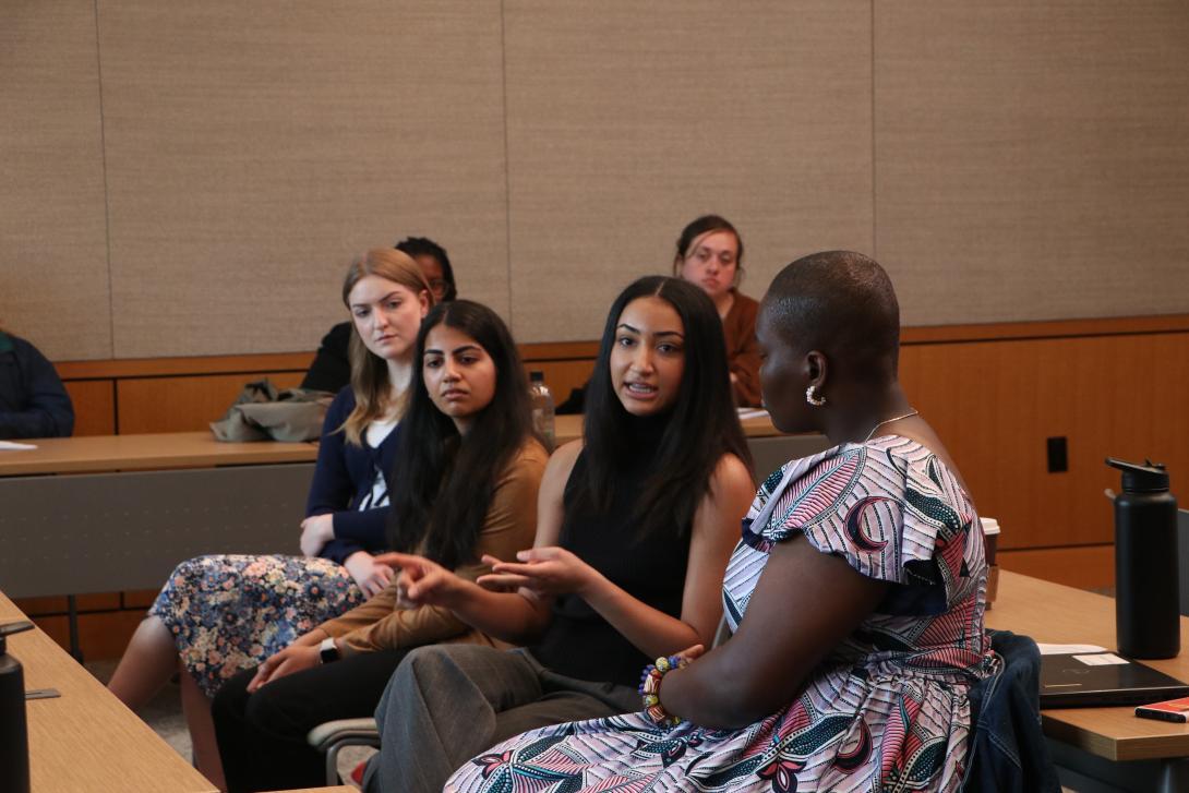 Students discuss in a classroom